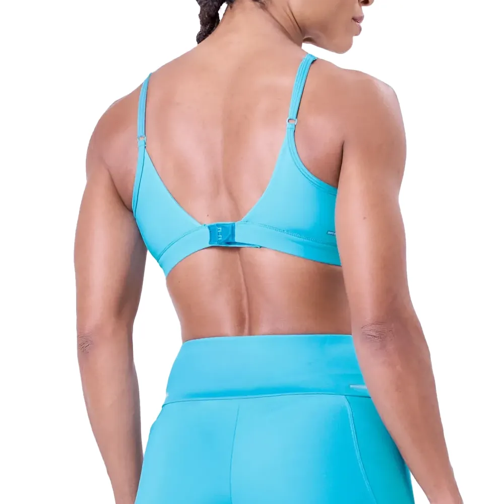 Top esportivo ajustável feminino Authen azul claro vista frontal ajustado ao corpo